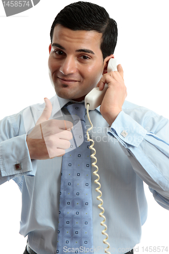 Image of Business man using telephone success