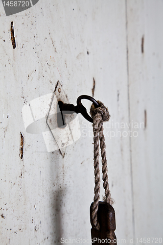 Image of Old key in old door