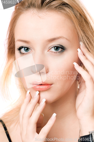 Image of Closeup portrait of a playful beautiful blonde