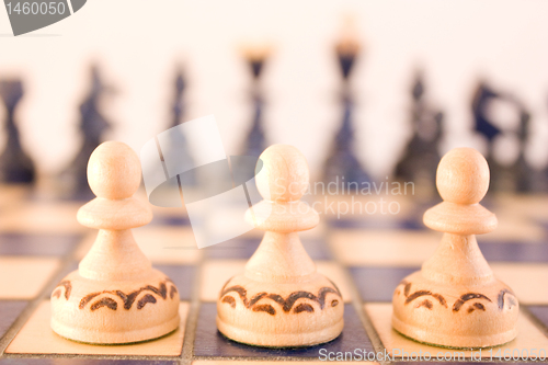 Image of Ready for the battle - three pawns