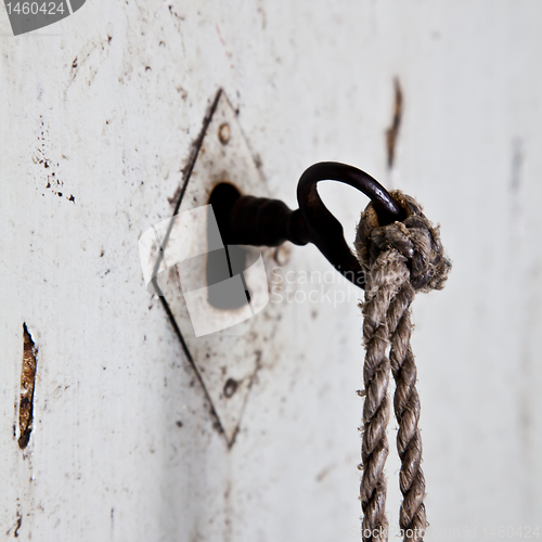 Image of Old key in old door