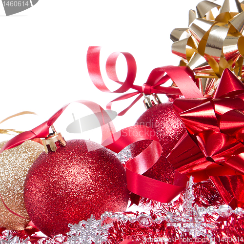 Image of christmas balls with ribbon and tinsel