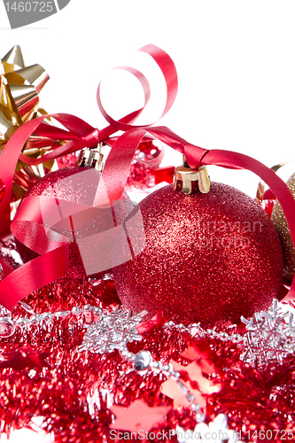Image of christmas balls with ribbon and tinsel