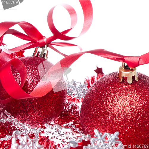 Image of christmas balls with ribbon and tinsel