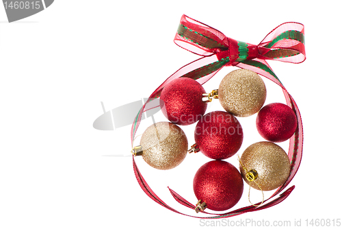 Image of christmas balls with big ribbon around