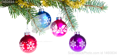 Image of christmas balls on spruce branch