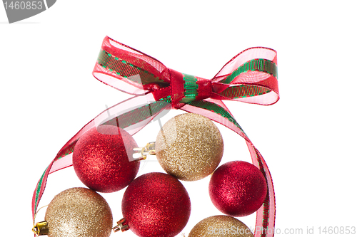 Image of christmas balls with big ribbon around