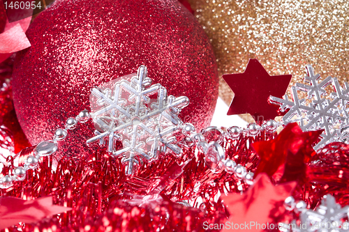 Image of christmas balls with ribbon and tinsel