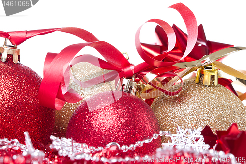 Image of christmas balls with ribbon and tinsel