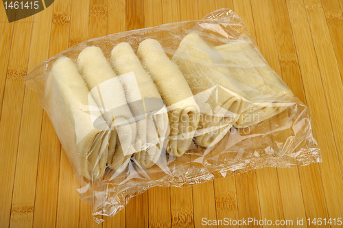 Image of package frozen pancakes on a wooden table