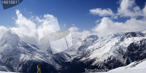 Image of Panorama Caucasus Mountains. Slope with skier. 