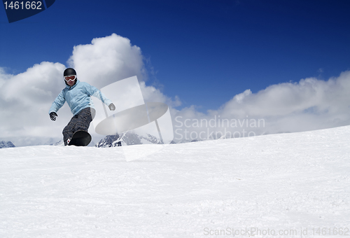 Image of Snowboarding in high mountains