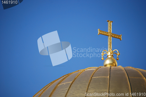 Image of Golden cross and dome close-up
