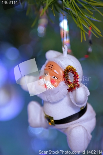 Image of Toy Santa Claus on a Christmas tree