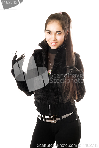 Image of Portrait of happy young brunette in gloves