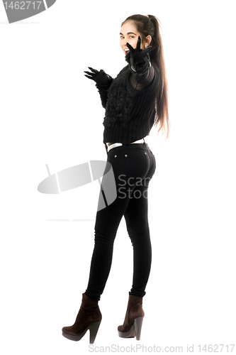 Image of Playful girl in gloves with claws