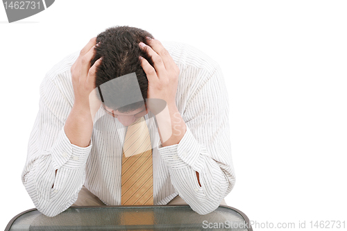 Image of Close up of businessman holding hands up to face 