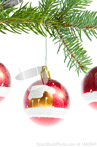 Image of red christmas ball on branch