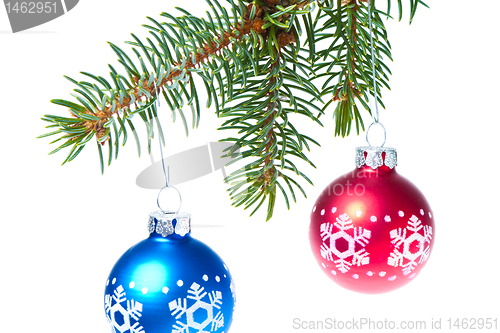 Image of ball hanging from spruce christmas tree