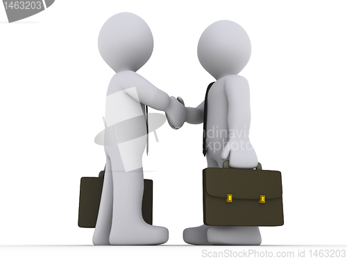 Image of Businessmen shake hands
