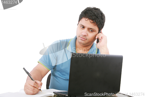 Image of Man with cellphone and laptop, isolated on white