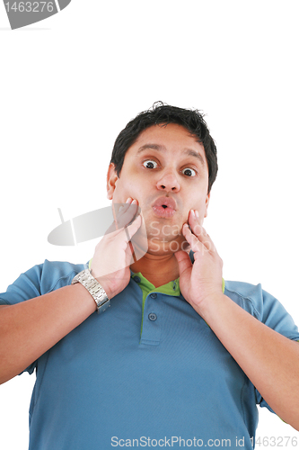 Image of Portrait of young surprised man gesturing. Isolated on white. 