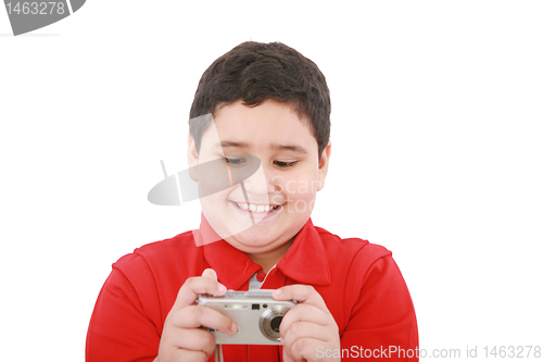 Image of small boy with digital camera on white background 