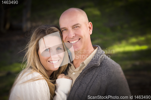 Image of Attractive Couple Wearing Sweaters in Park