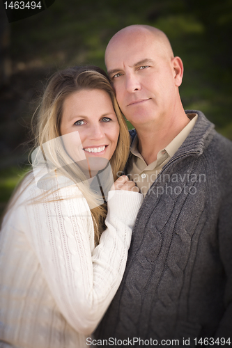 Image of Attractive Couple Wearing Sweaters in Park