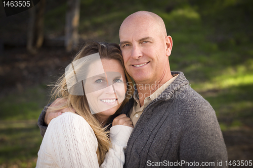 Image of Attractive Couple Wearing Sweaters in Park