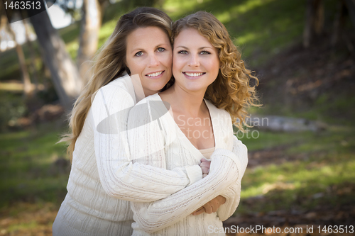 Image of Pretty Mother and Daughter Portrait in Park