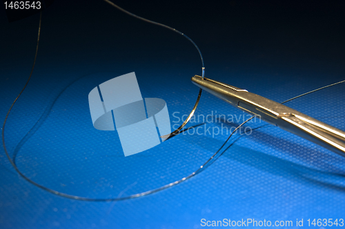 Image of Needle waiting coming surgery on studio ground