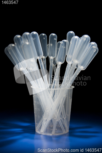 Image of Pack of pipettes standing in measure glass
