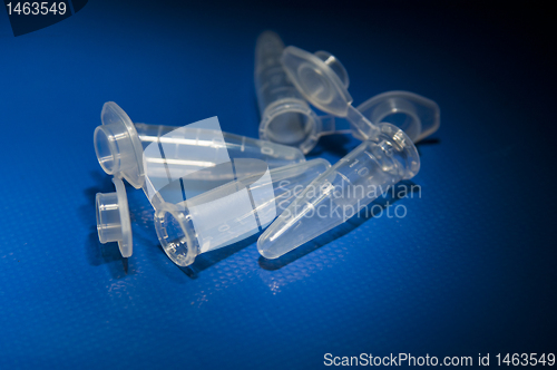 Image of Tubes laying on table empty and open