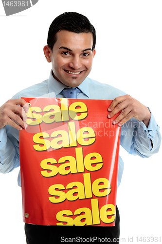 Image of Retailer with sale sign