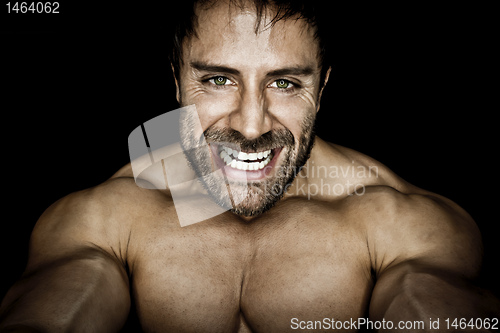 Image of angry muscled bodybuilding man