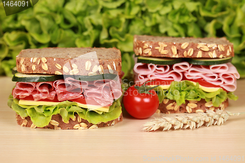 Image of Sandwiches with salami and ham