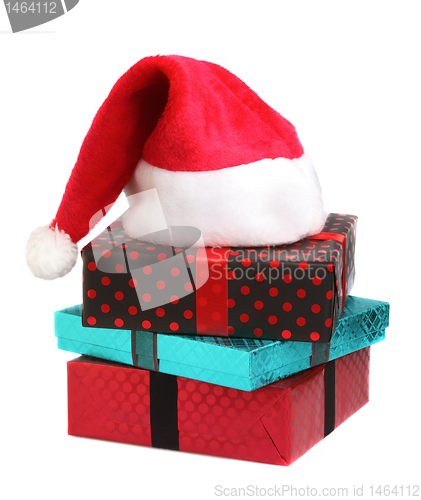 Image of Christmas gift and santa hat 