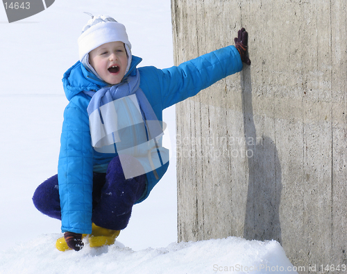 Image of Young girl near the concrete wall