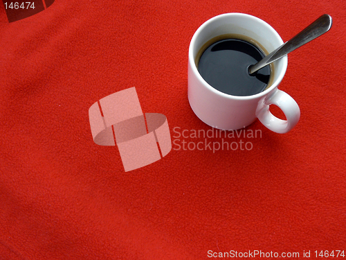 Image of Coffee cup on red