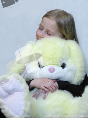 Image of Young girl with lovely toy