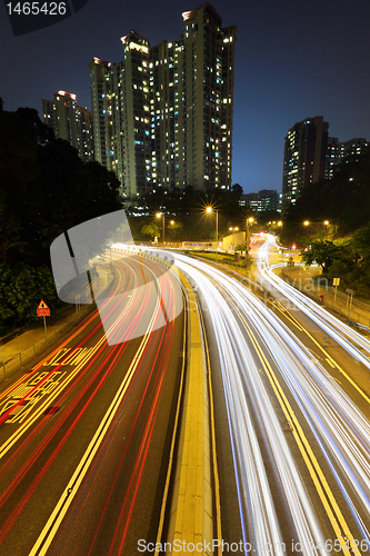 Image of car trails in city