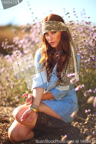 Image of Beautiful Woman on a Field in Summertime 