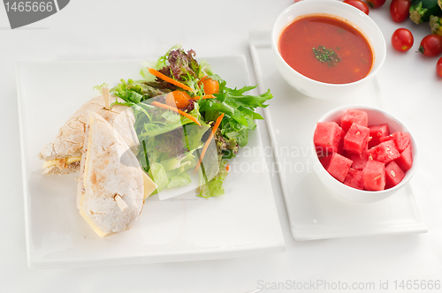 Image of tuna and cheese sandwich with salad