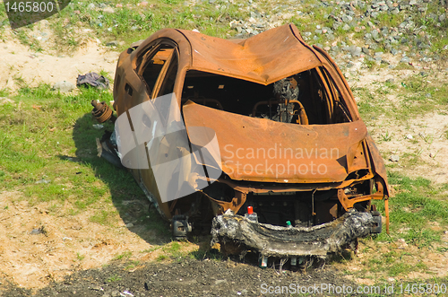 Image of burnt out car