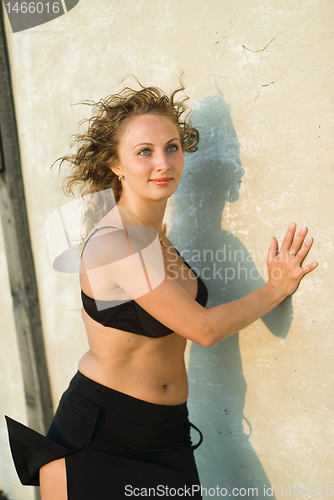 Image of Young woman on roof