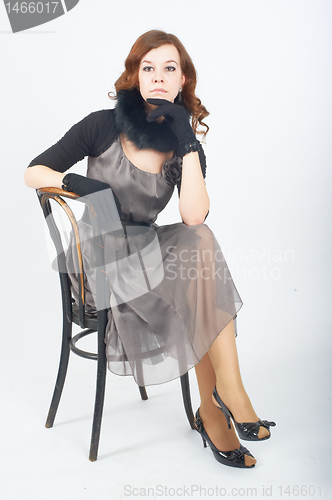 Image of Pretty woman on chair