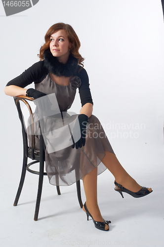 Image of Pretty woman on chair