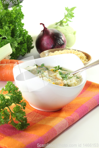 Image of Noodle soup with parsley