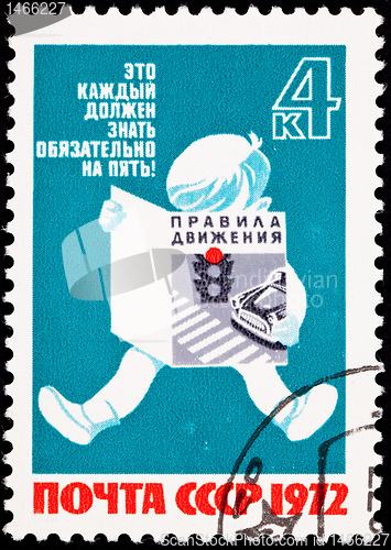 Image of Soviet Russia Post Stamp Young Child Reading Traffic Safety Book